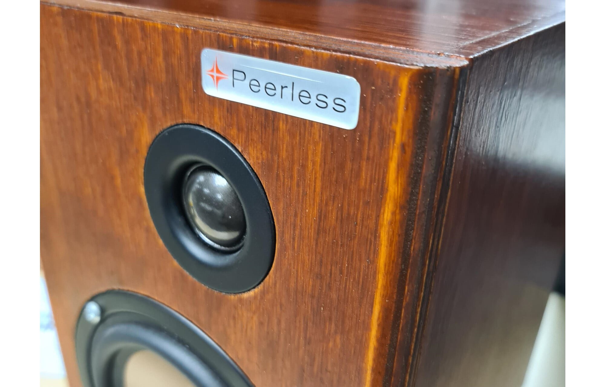 Peerless by Tymphany logoplate